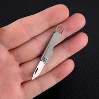 Petit couteau de poche portable en alliage de titane, pliable, léger, avec lame en acier et porte-clés