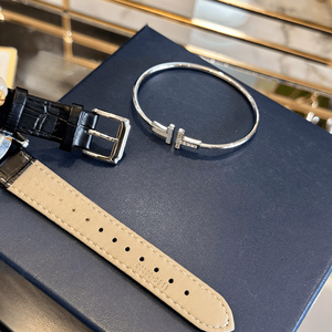 Refined Round Quartz Watches with <b>Floating</b> Crystal Accents Roman Numeral Dial and Sleek Leather Strap for Women Chopards - Product Image 2