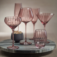 Collection de verrerie optique : Verres à vin, coupes à champagne et coupes à martini en cristal rose, gris, bleu et transparent, à long pied, en promotion