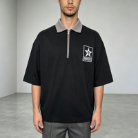 Polo noir à blocs de couleur, 100 % coton, sérigraphié, coupe ample oversize, style streetwear