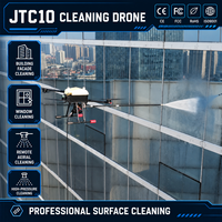 Drone de nettoyage aérien industriel, nettoyeur à jet d'eau télécommandé, système de nettoyage de façade de bâtiment UAV pour les services de nettoyage des murs extérieurs