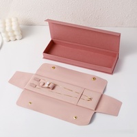Pochette enveloppe de luxe en microfibre avec logo personnalisé et fermeture à bouton-pression pour colliers longs, boucles d'oreilles, bracelets et bagues