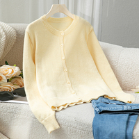 Cardigan en tricot simple boutonnage décontracté pour femmes pull de style européen américain à épaules tombantes pull en tricot pour femmes