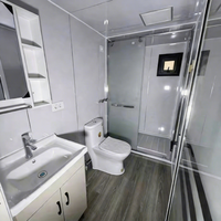 Maison conteneur extensible de luxe moderne entièrement personnalisée avec toit triangulaire, 2 chambres, cuisine, salon et salle de bain