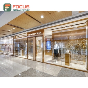 Sistema de Exhibición de Acero Inoxidable Cepillado para Tiendas de Ropa, Venta Directa de Fábrica, Servicio OEM - Product Image 1