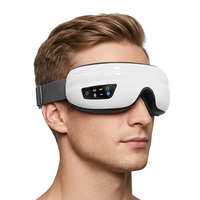 Augenmassagegerät mit Luftdruck-Kompression, Bluetooth-Musik, Graphen-Heizung, 2-stufiger Heißkompresse, Faltbar, Großhandel Augenmassagegerät