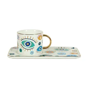 Taza de café de cerámica SYL, juego de platillo de taza de ojo malvado de lujo, diseño de taza de té de la tarde, juego de regalo de café delicado