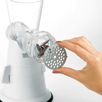 Multifunctionele handmatige roterende kaas-, fruit- en groentesnijder met handvat en ronde draaibak voor huishoudelijk gebruik