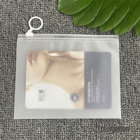 Pochette de voyage cosmétique réutilisable personnalisée en CPE dépoli avec fermeture éclair et anse à anneau, finition mate, pour échantillons de shampoing et mascara