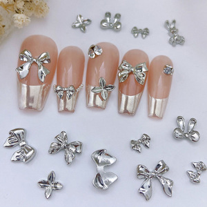 Nuevo Estilo, Venta al por Mayor, 10 Piezas/Bolsa, Adornos de Uñas con Forma de Mariposa, Lazo, Luna y Conejo, Aleación Dorada y Plateada, Accesorios de Uñas de Lujo - Product Image 1