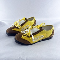 Sepatu kets biskuit kuning wanita, gaya Niche, warna kontras, High-end Sense, sepatu datar kasual untuk wanita