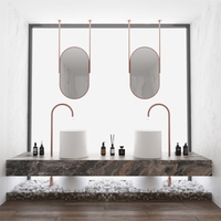 Meuble-lavabo double mural en bois de noyer foncé avec vasques à poser, miroir LED à cadre doré, robinets chromés, style moderne