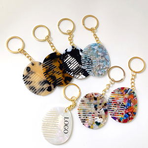 Peigne à cheveux avec logo personnalisé porte-clés sac porte-clés de voiture accessoires de sac à main sac à dos décors cadeaux de Saint Valentin - Product Image 1