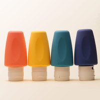 Nuevo Color personalizado plegable Squeeze cosmético 100ML silicona loción champú botella viaje botella conjunto
