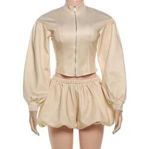 Nuevo Conjunto Deportivo de Dos Piezas de Alta Calidad con Logotipo Personalizado, Top con Cremallera y Hombros Caídos, Falda Deportiva de Cintura Alta - Product Image 2