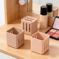 Vente en gros de boîtes de rangement en silicone sculptées de haute qualité, étui de voyage portable, étanche, pour cosmétiques, style européen
