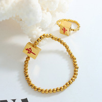 Ensemble de bijoux pour les mains en acier inoxydable plaqué or PVD, bracelet unique en corde extensible rouge de taille moyenne, anneau de doigt, chaîne à perles