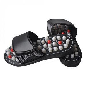 Zapatillas de masaje de acupuntura Sandalia Pies unisex Terapia de acupresión China Zapatos de masaje de pies giratorios médicos Masajeador de piernas - Product Image 1