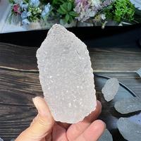 Vente en gros de cristal de quartz naturel Nirvana, pierre de bouddha brute de guérison, pierre précieuse, quartz blanc clair brut, pierre minérale pour l'artisanat