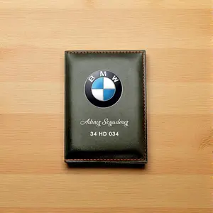 Porte-plaque d'immatriculation personnalisé pour voiture, design en cuir noir avec logo BMW - Product Image 1