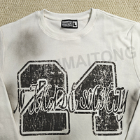 T-shirt vintage personnalisé en maille gaufrée 380g, respirant, écologique, avec impression DTG et motif graphique, effet délavé par pulvérisation.