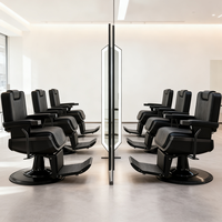 Fauteuil de coiffure inclinable haut de gamme entièrement noir avec pompe hydraulique et rotation, chaise de rasage de salon moderne, fauteuil de barbier