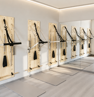 Rack mural de Pilates commercial MJD-W24 en bois d'érable pour studio de Pilates
