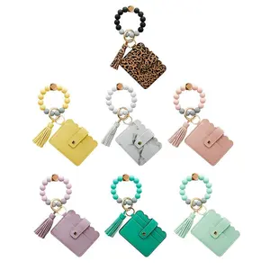 New design silicone beaded bracelet wristlet wallet leather Card Holder with rubber string bangle tassel keychain