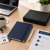 Ensemble cadeau de bienvenue compact pour employés avec logo personnalisé, comprenant un carnet A5 en PU et un stylo métallique, idéal pour la mise en route des nouveaux embauchés et les événements d'entreprise.