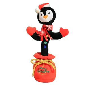 Peluche di vendita caldo che canta e balla ripetendo divertente Gingerbread Man Penguin Gingerbread Man Dancing Toy con cappello di natale