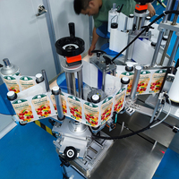 Machine d'étiquetage automatique électrique pour bouteilles rondes avec PLC pour pots de cosmétiques, huiles essentielles, crèmes (emballages en cartons)