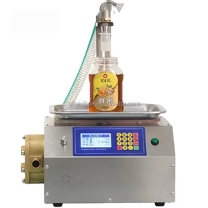 Máquina de llenado semiautomática de alta viscosidad para botellas pequeñas de plástico de champú, crema cosmética, miel y ostra, tipo pesaje - Product Image 1