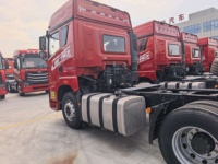 Camion tracteur diesel d'occasion FAW JH6 6x4 de la marque China Liberation, >450 ch, norme Euro 3, capacité de charge 31-40T, caméra de recul, siège à suspension pneumatique