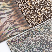 Lots en stock élastique coloré nylon spandex paillettes néon imprimé feuille tissu maillots de bain vêtements de danse vêtements de performance tissus de bikini