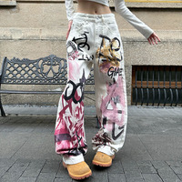 Pantalon large blanc vieilli à imprimé abstrait dessiné à la main, style American High Street, avec motif graffiti urbain et coupe couteau, pour hommes et femmes