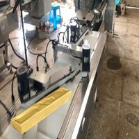 Machine d'emballage de chocolat en barres d'or avec film, distribution de colle, fonctionnement rapide, personnalisable