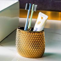 Ensemble d'accessoires de salle de bain de luxe en porcelaine dorée 4 pièces en céramique pour la maison