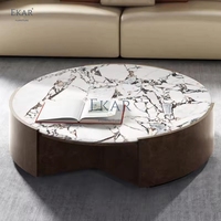 Table basse ronde moderne avec dessus en marbre et base en métal pour salon