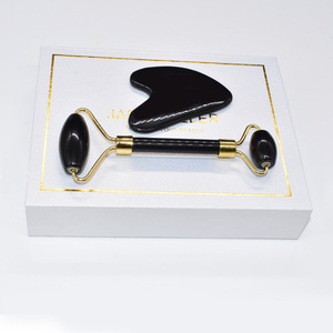 Werks bedarf Schwarz-Weiß-Kristallrollen-Gesichts massage gerät Zwei-Kopf-Jade-Rollen-Herzschaber-Jade-Massage gerät Geschenkset - Product Image 1