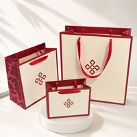 Sac fourre-tout en papier blanc de luxe avec logo personnalisé OEM imprimé, avec poignée, pour vêtements, chaussures, emballage cadeau
