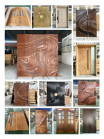 Porte d'entrée en bois massif sculpté noir et blanc, style artistique moderne, luxe, sur mesure, pour villa.