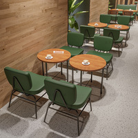 Ensemble de sièges de café commercial moderne avec banquette rembourrée, table basse ronde et chaises pour glacier