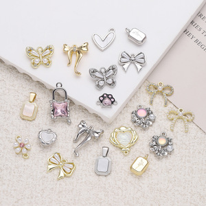 Breloques en alliage, pendentifs papillon, nœud, cœur, en alliage de zinc, accessoires de bijoux DIY, breloques unisexes tendance - Product Image 1