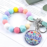 Nouveauté 2026 : Porte-clés en silicone perlé style mignon, avec pompon en PU hexagonal, pour bracelets et porte-clés – Vente en gros