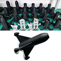 Drone noir à 4 hélices avec caméra centrale, cadre en plastique, design compact pour une utilisation en intérieur et en extérieur