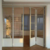 Porte pliante ZS à cadre fin, panneaux de verre minimalistes, quincaillerie dissimulée, glissière fluide, entrée de bâtiment commercial
