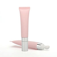 Tube cosmétique en plastique PE rose scellé 25g 30g pour crème contour des yeux et brillant à lèvres, emballage personnalisé avec applicateur à pointe céramique et capuchon argenté