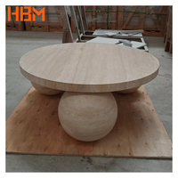 Table basse moderne en travertin sculpté avec pieds en pierre, finition polie, taille personnalisable, garantie 3 ans, pour salon, hôtel, villa