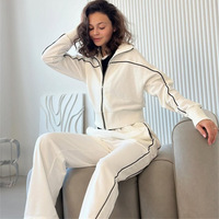 Ensemble deux pièces décontracté sport vintage avec cardigan zippé à manches longues, sweat-shirt uni coupe ample grande taille et pantalon élastique à jambes larges
