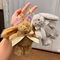 Peluche Lapin Mignon Européen en Sable 12CM, Jouet en Coton PP Doux pour Filles de 2 à 4 Ans, Cadeau de Pâques avec Nœud et Porte-clés